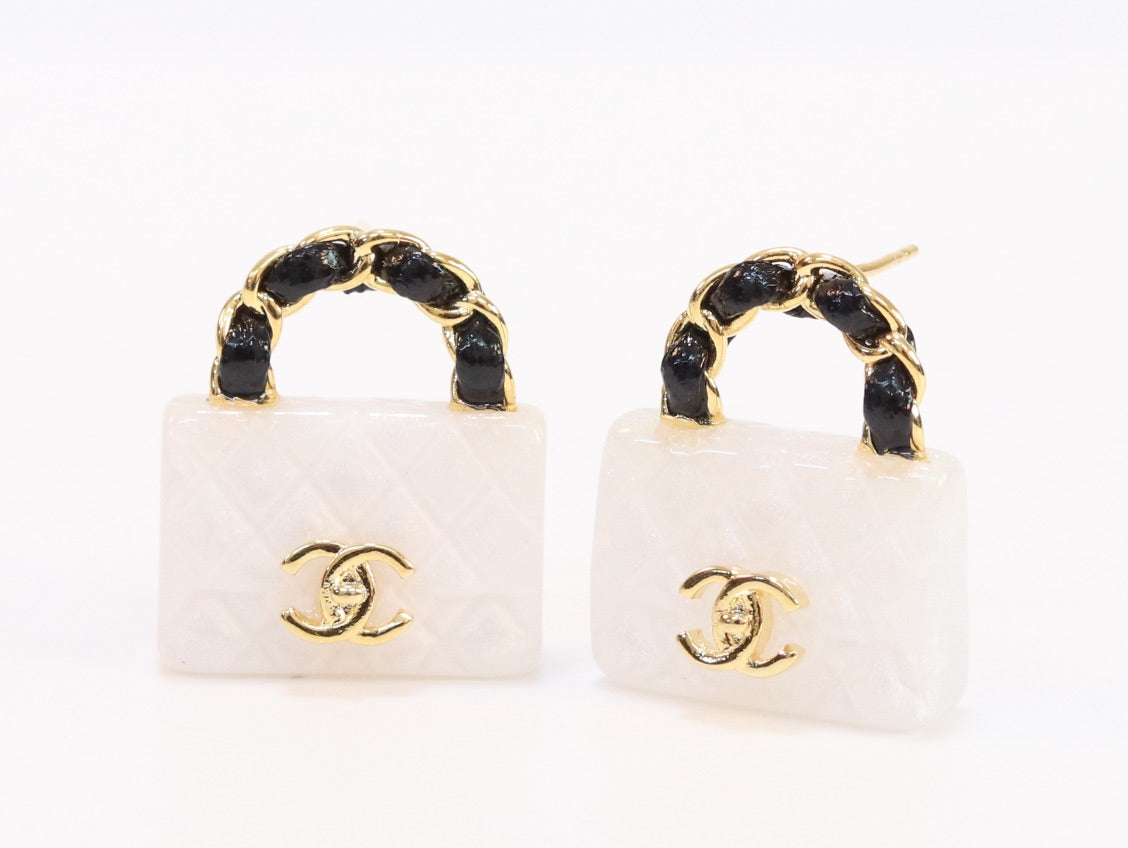 Black and white Double C purse earrings in gold