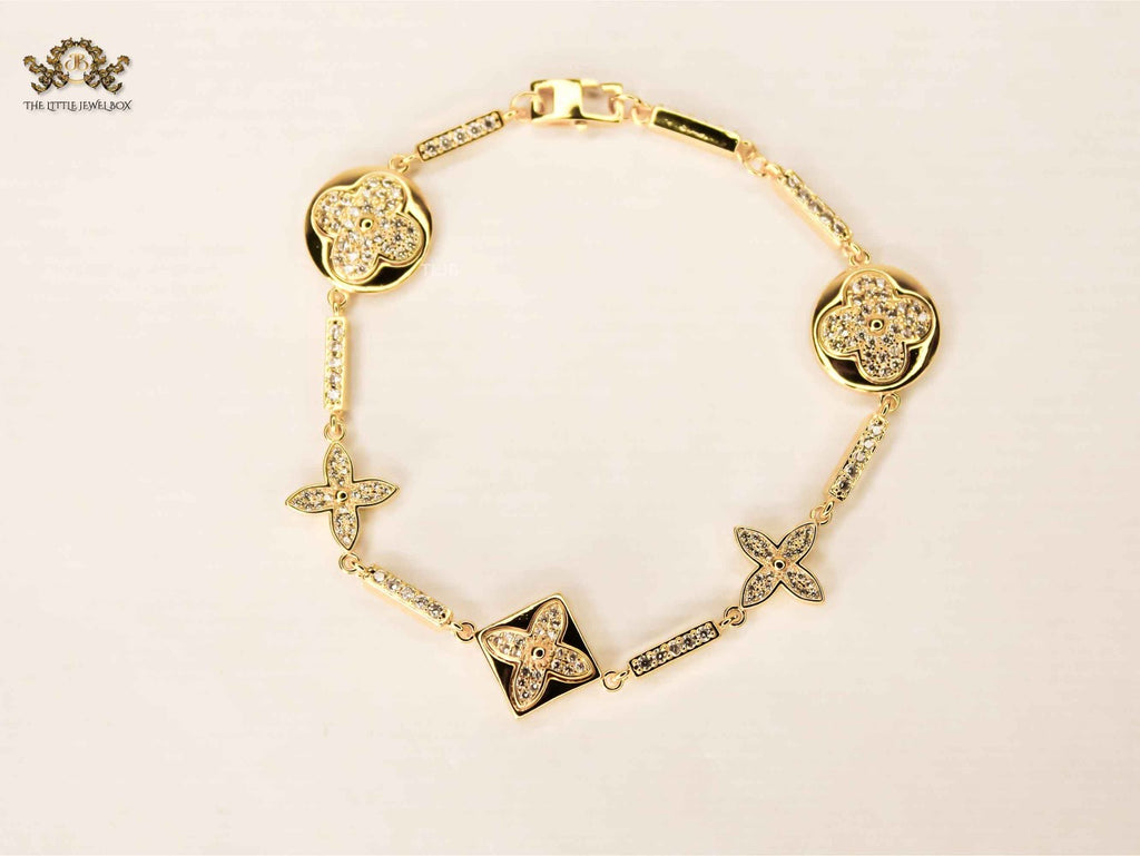 Alphabet L & V gold dazzle bracelet