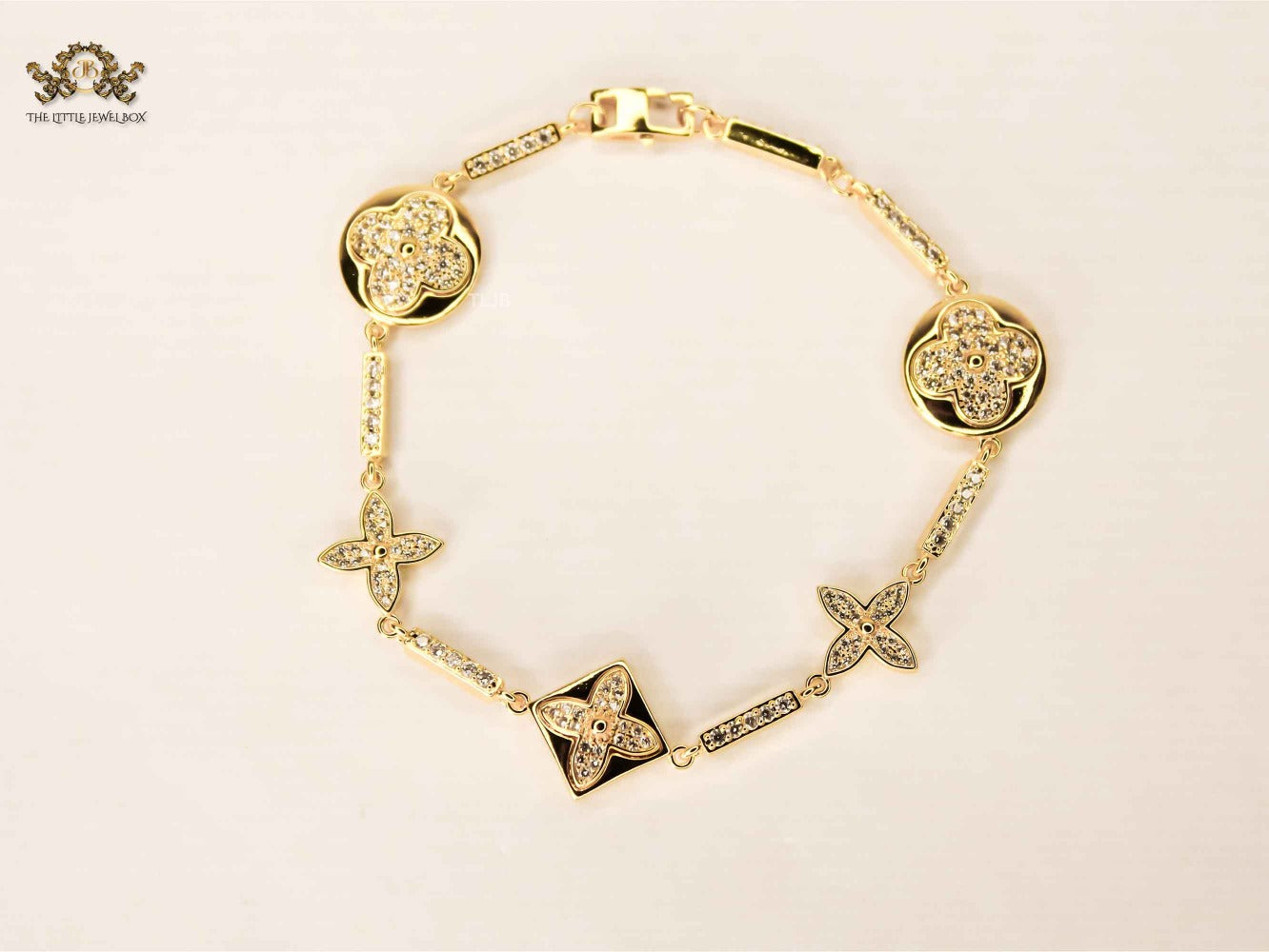 Alphabet L & V gold dazzle bracelet