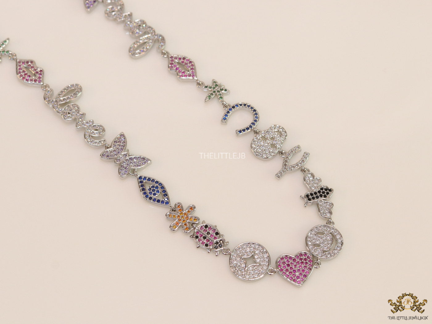 Platinum plated choker style cz lucky charm necklace