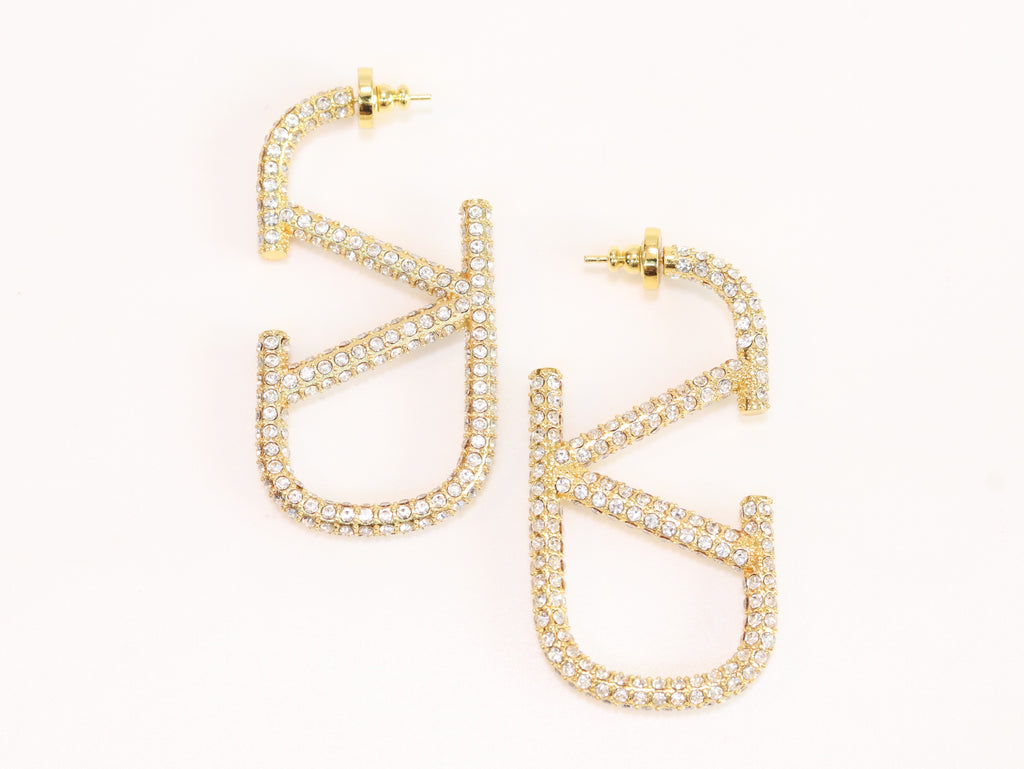Open golden alphabet V earrings with cz 62 mm