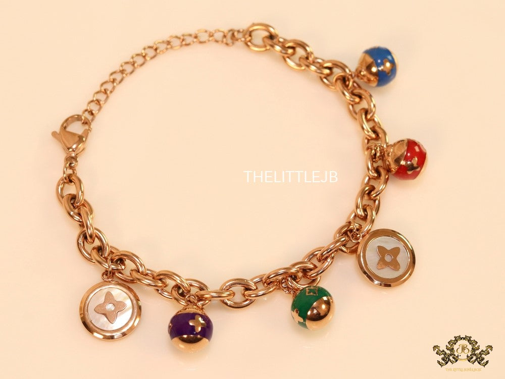 Rose gold plated link chain bracelet with multi enamel and MOP charms
