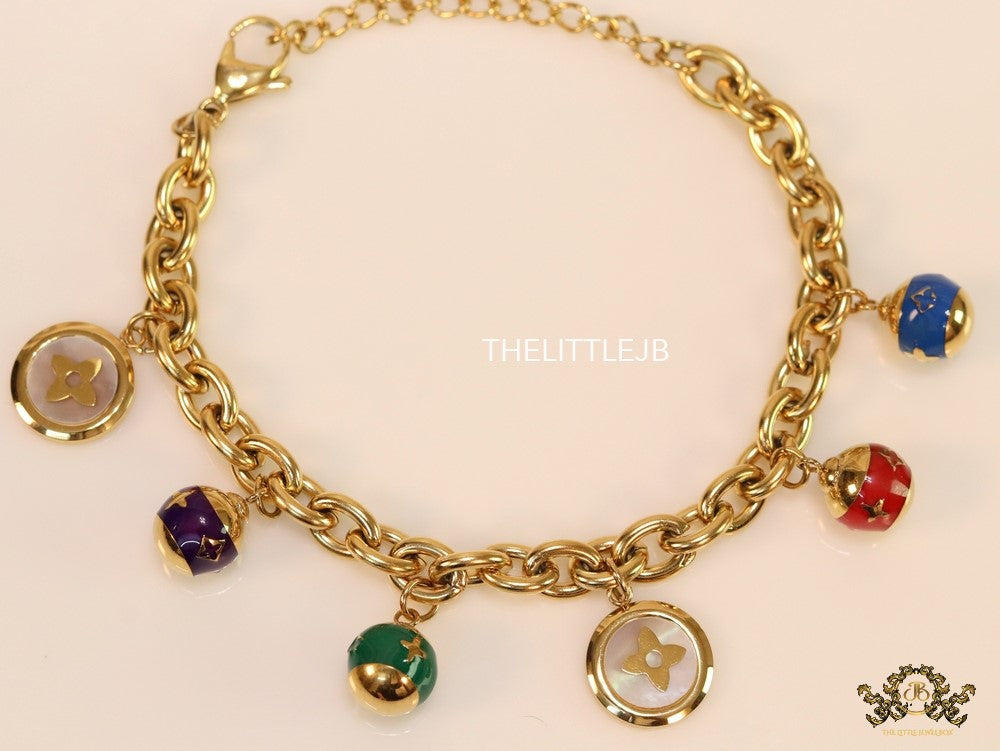 Gold plated link chain bracelet with multi enamel and MOP charms