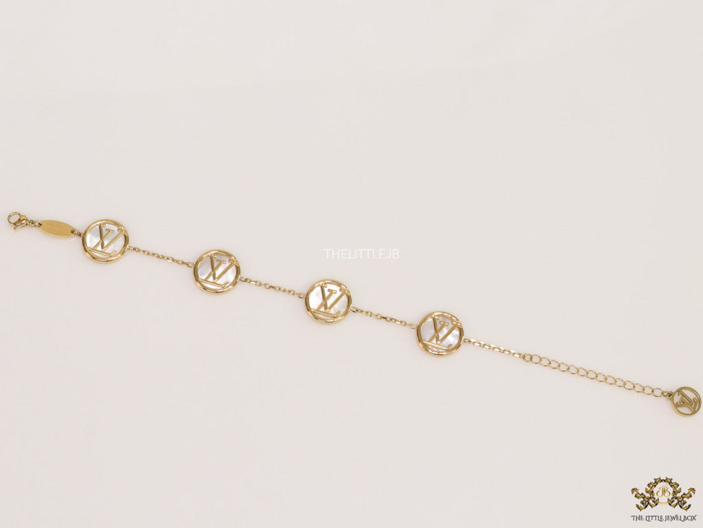 Gold plated sleek chain bracelet with MOP discs