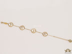 Gold plated sleek chain bracelet with MOP discs