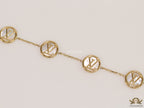 Gold plated sleek chain bracelet with MOP discs