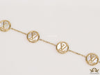 Gold plated sleek chain bracelet with MOP discs