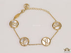 Gold plated sleek chain bracelet with MOP discs