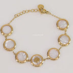 Gold plated chain bracelet with T motif on MOP