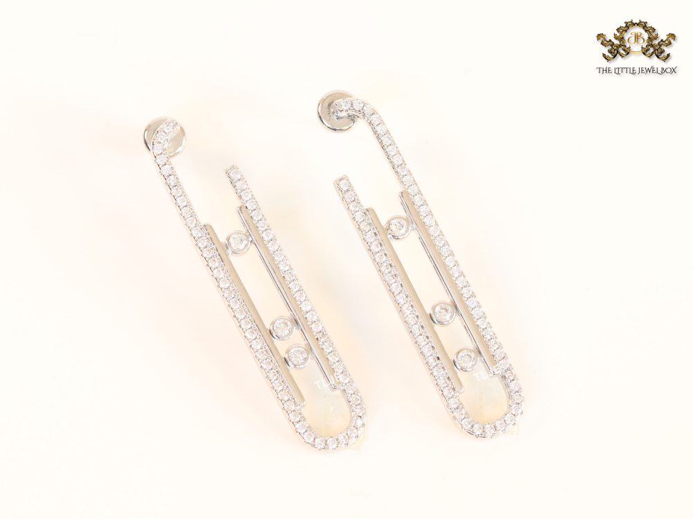 Platinum  sleek Cz earrings with 3 stones