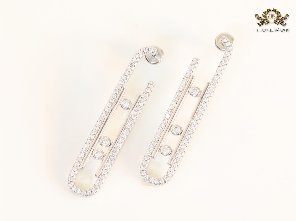 Platinum  sleek Cz earrings with 3 stones