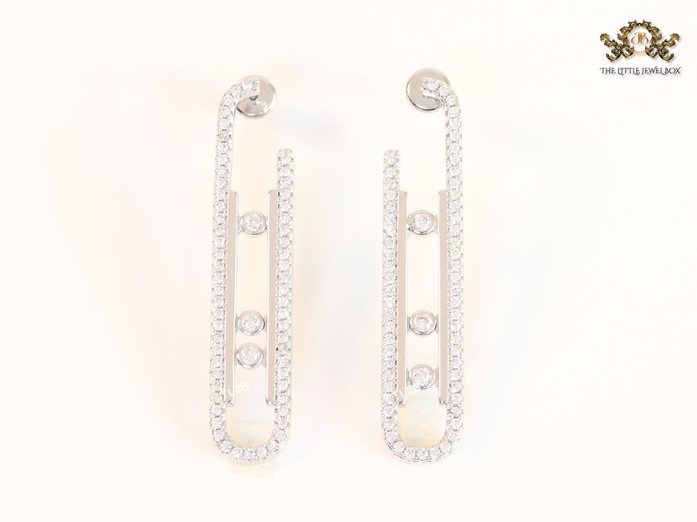 Platinum  sleek Cz earrings with 3 stones