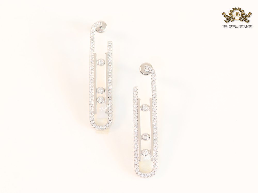Platinum  sleek Cz earrings with 3 stones