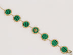 Gold plated chain bracelet with T motif on malachite green discs