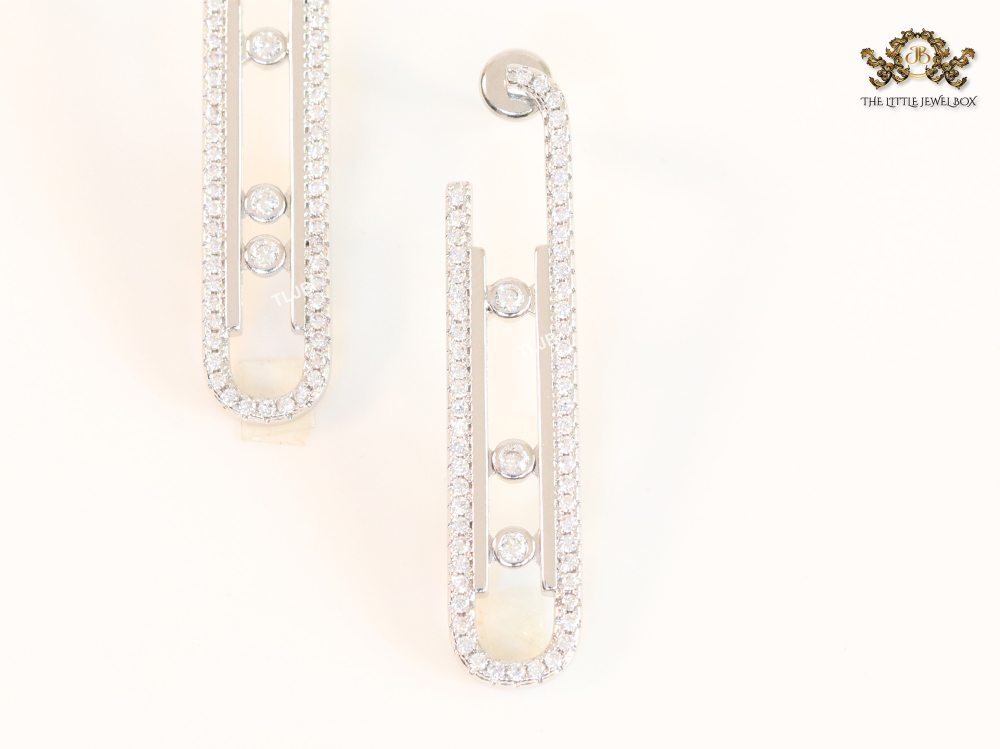 Platinum  sleek Cz earrings with 3 stones