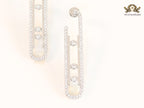 Platinum  sleek Cz earrings with 3 stones