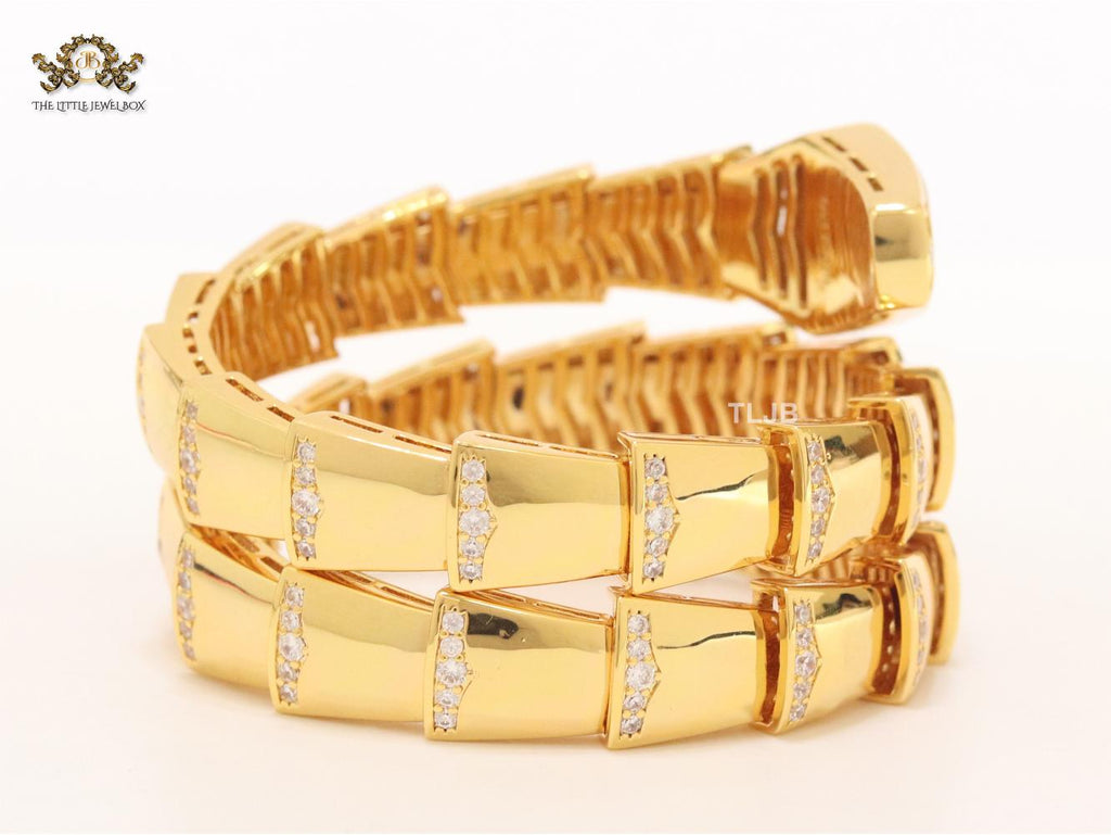Bold gold and cz snake bracelet with mop head