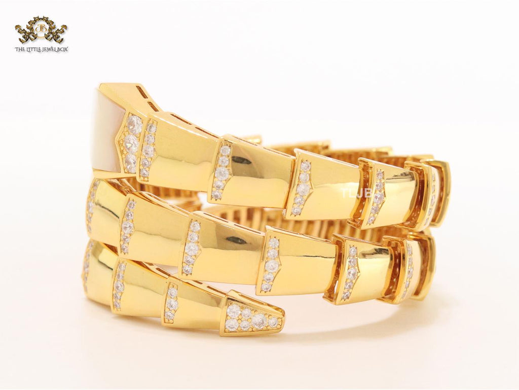 Bold gold and cz snake bracelet with mop head