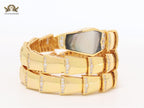 Bold gold and cz serpenti bracelet with black mop head