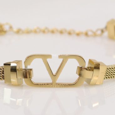 Gold plated watch strap bracelet with V motif
