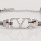 Platinum plated watch strap bracelet with V motif