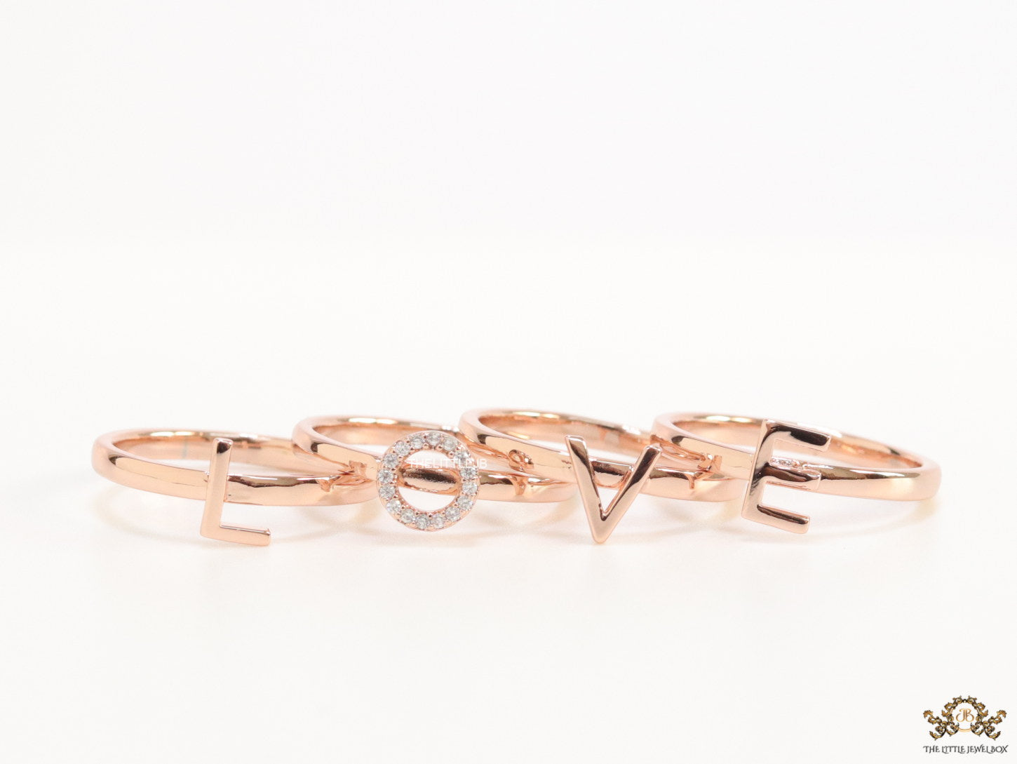 Gold plated layered alphabet ring with tiny embedded cz stones