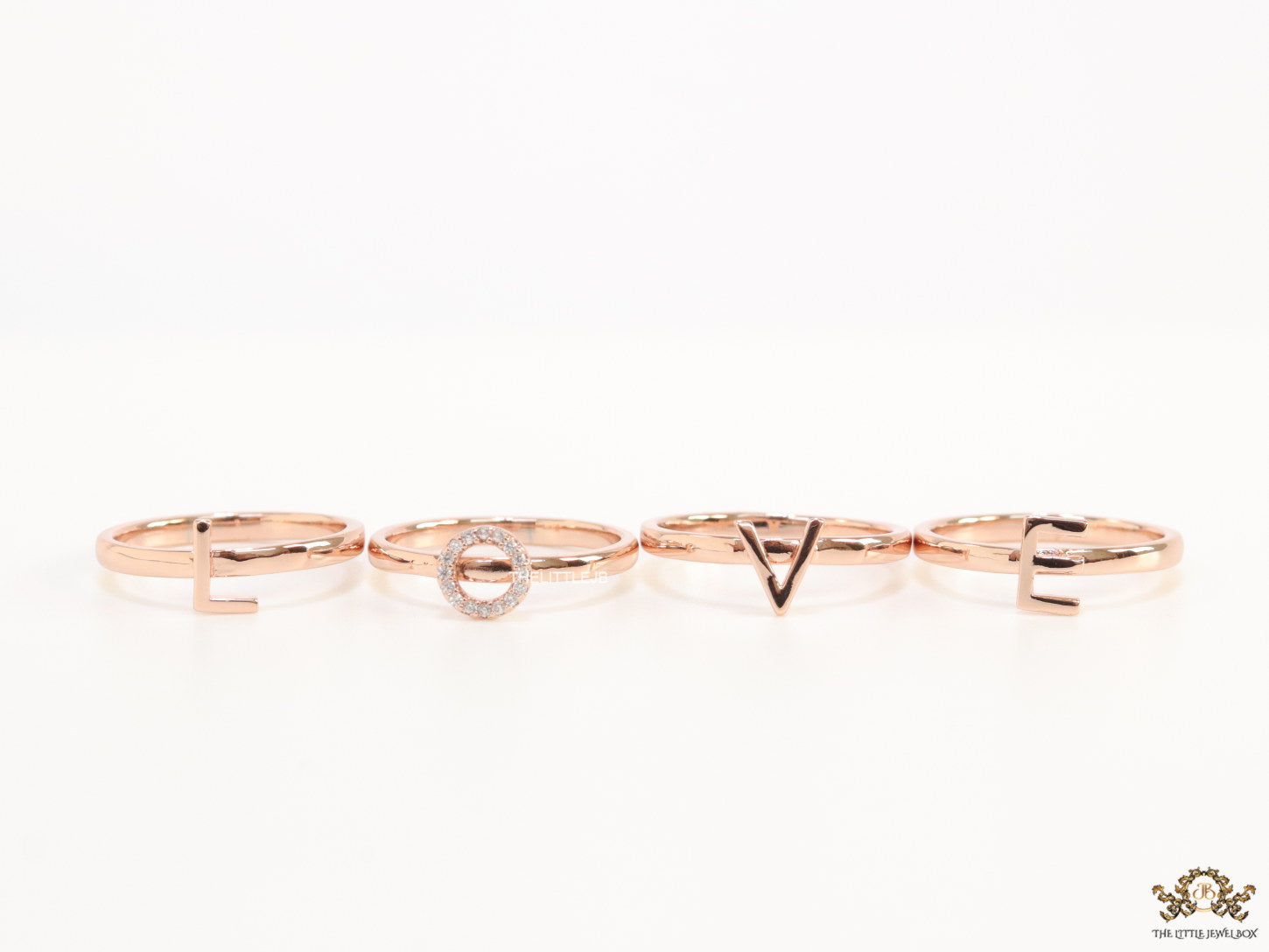 Gold plated layered alphabet ring with tiny embedded cz stones