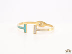 Gold plated open bracelet with blue enamel and MOP ends