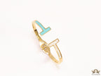 Gold plated open bracelet with blue enamel and MOP ends