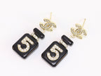 Double C gold danglers with 5 in CZ on black enamel
