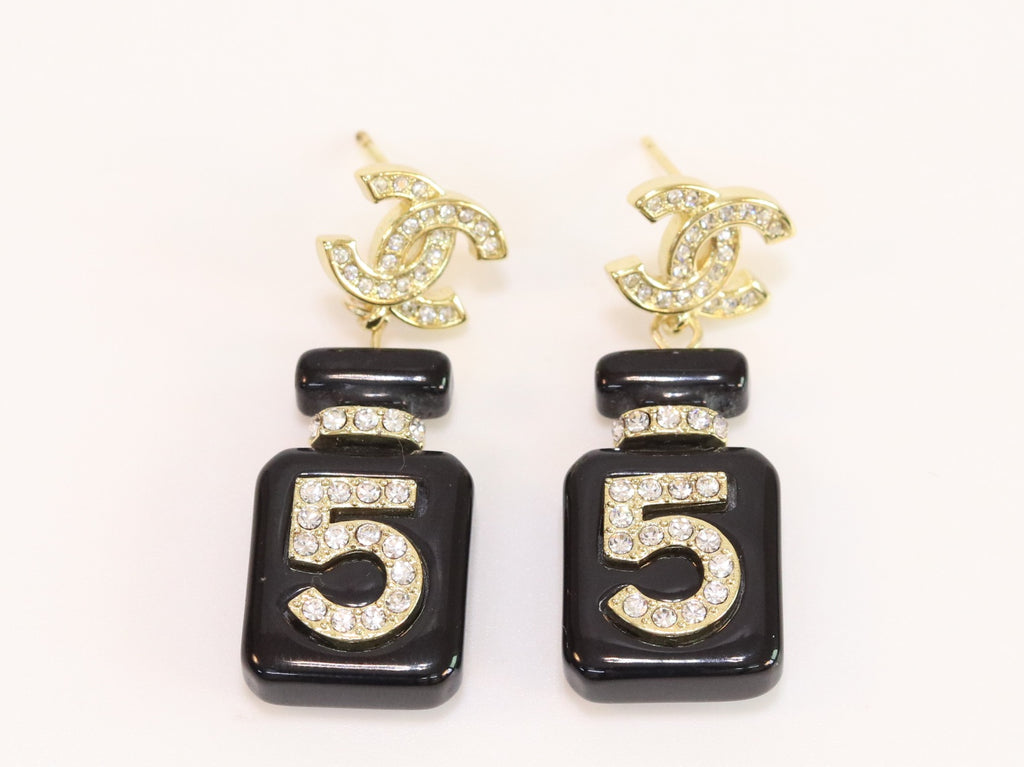 Double C gold danglers with 5 in CZ on black enamel