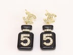 Double C gold danglers with 5 in CZ on black enamel