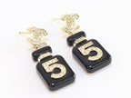 Double C gold danglers with 5 in CZ on black enamel