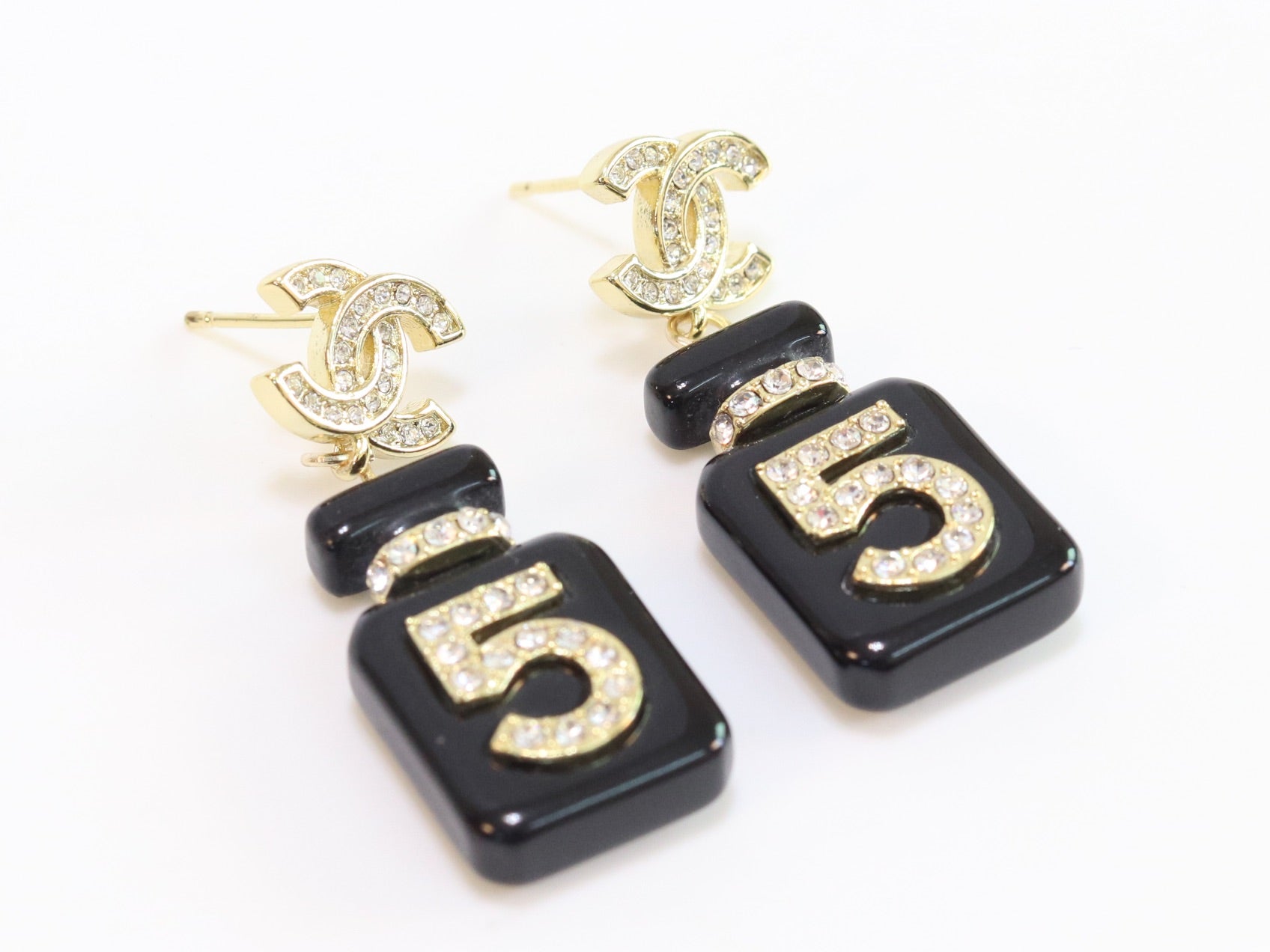 Double C gold danglers with 5 in CZ on black enamel