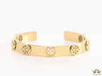 Gold plated open band bracelet with twin T motifs