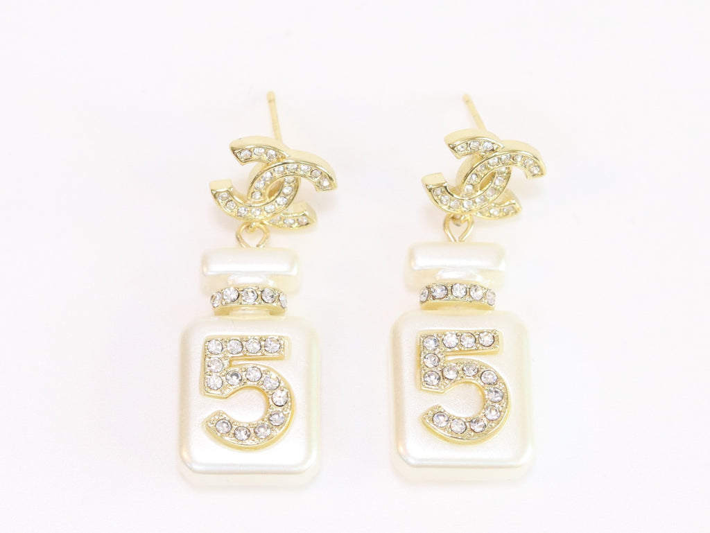 Double C gold danglers with 5 in CZ on white enamel