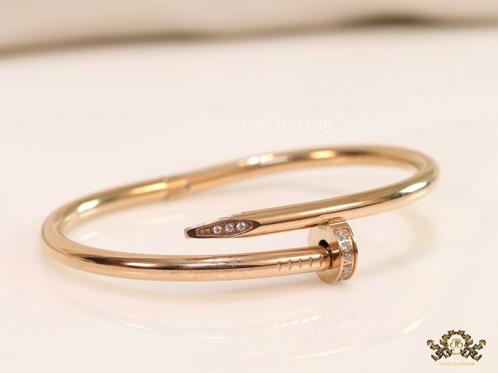 Rose gold plated nail bracelet with cz