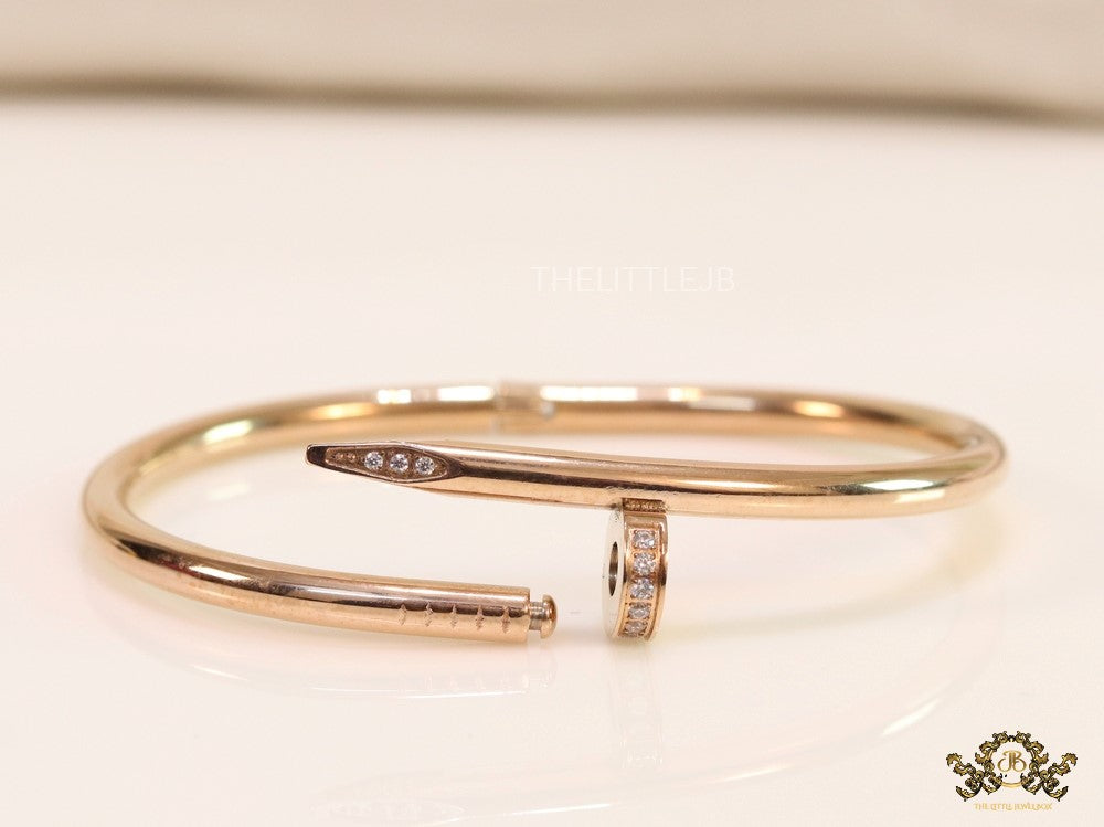 Rose gold plated nail bracelet with cz