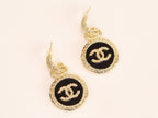 Double C on black enamel hanging gold earrings with CZ