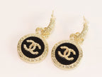 Double C on black enamel hanging gold earrings with CZ