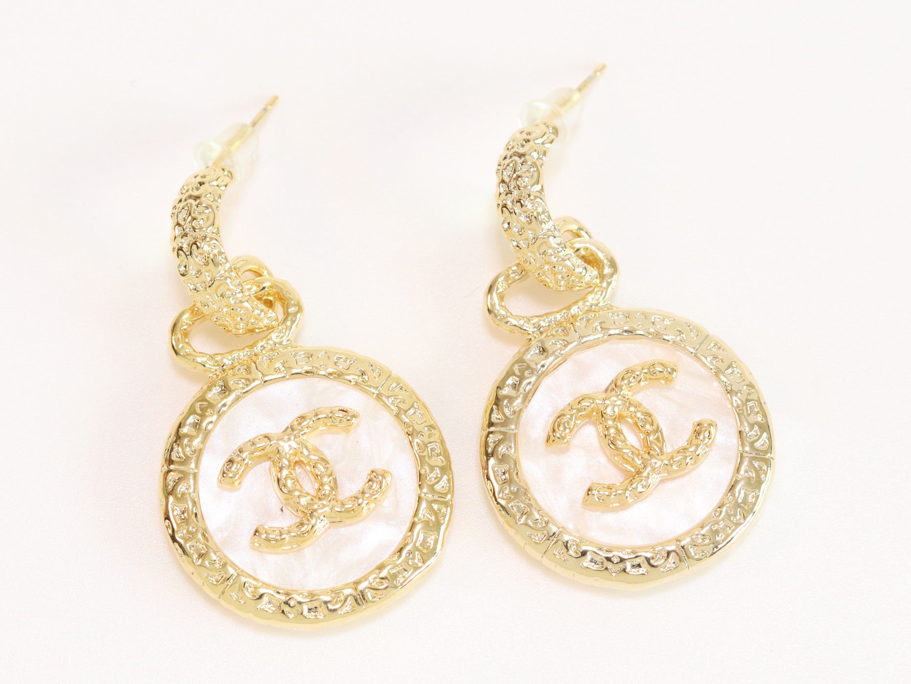 Double C on white enamel hanging gold earrings with CZ