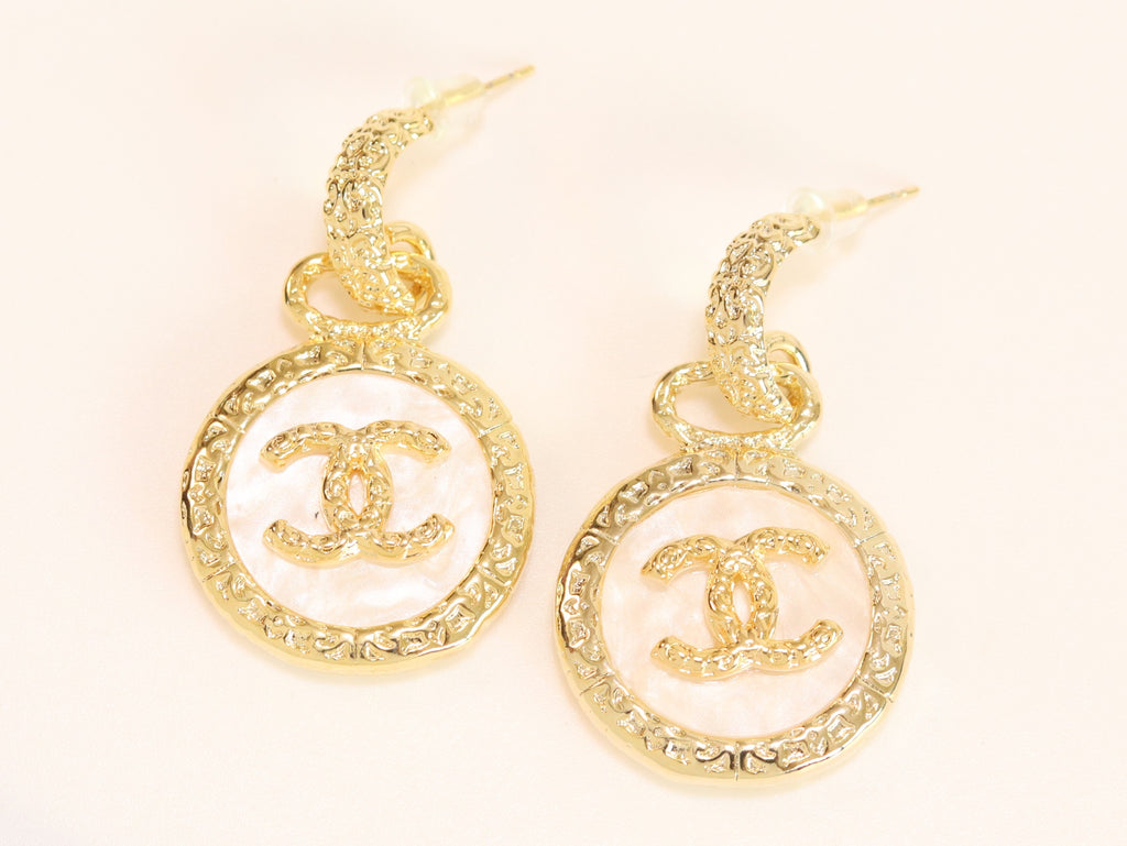 Double C on white enamel hanging gold earrings with CZ
