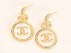 Double C on white enamel hanging gold earrings with CZ