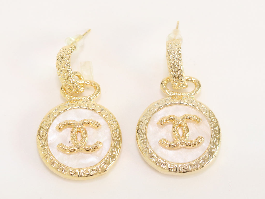 Double C on white enamel hanging gold earrings with CZ