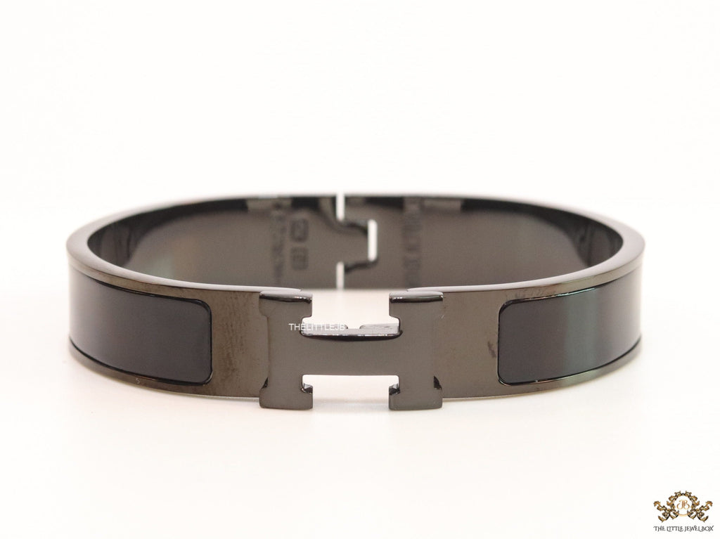 Broad black bracelet with H alphabet in centre
