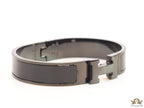 Broad black bracelet with H alphabet in centre
