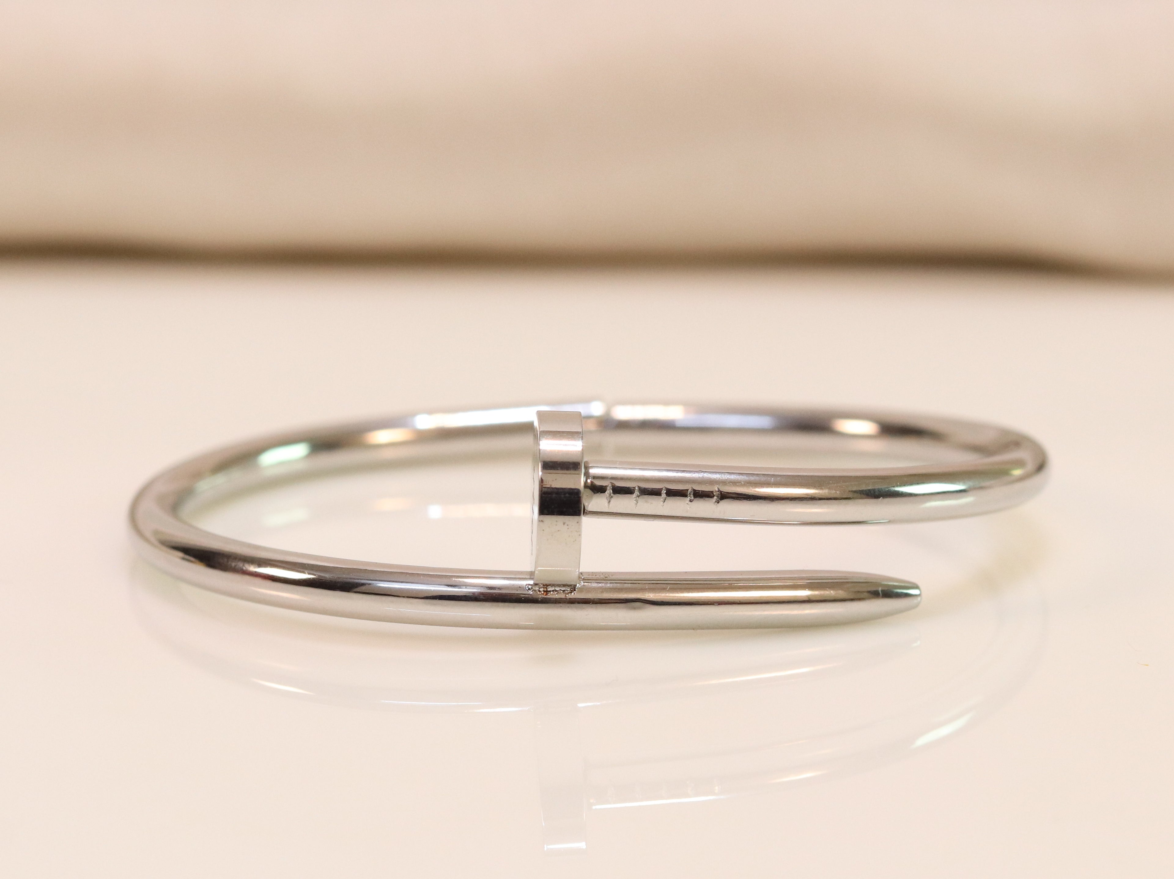 platinum plated nail bracelet with cz