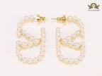 Alphabet V pearl embellished hoops