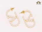 Alphabet V pearl embellished hoops