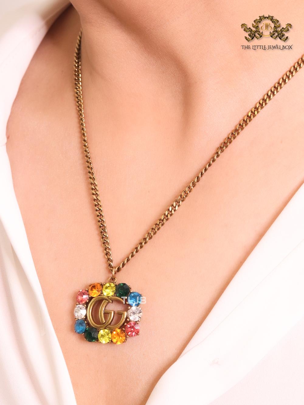 Rustic double g with multicoloured stones